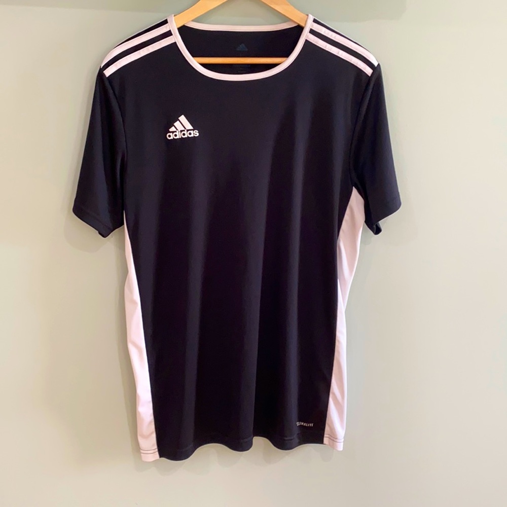 Black Adidas shirt in a size large.